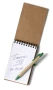 A6 spiral notebook | 70 pages | Recycled cardboard | Matching elastic and pen