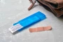 Plastic pocket case with five plasters