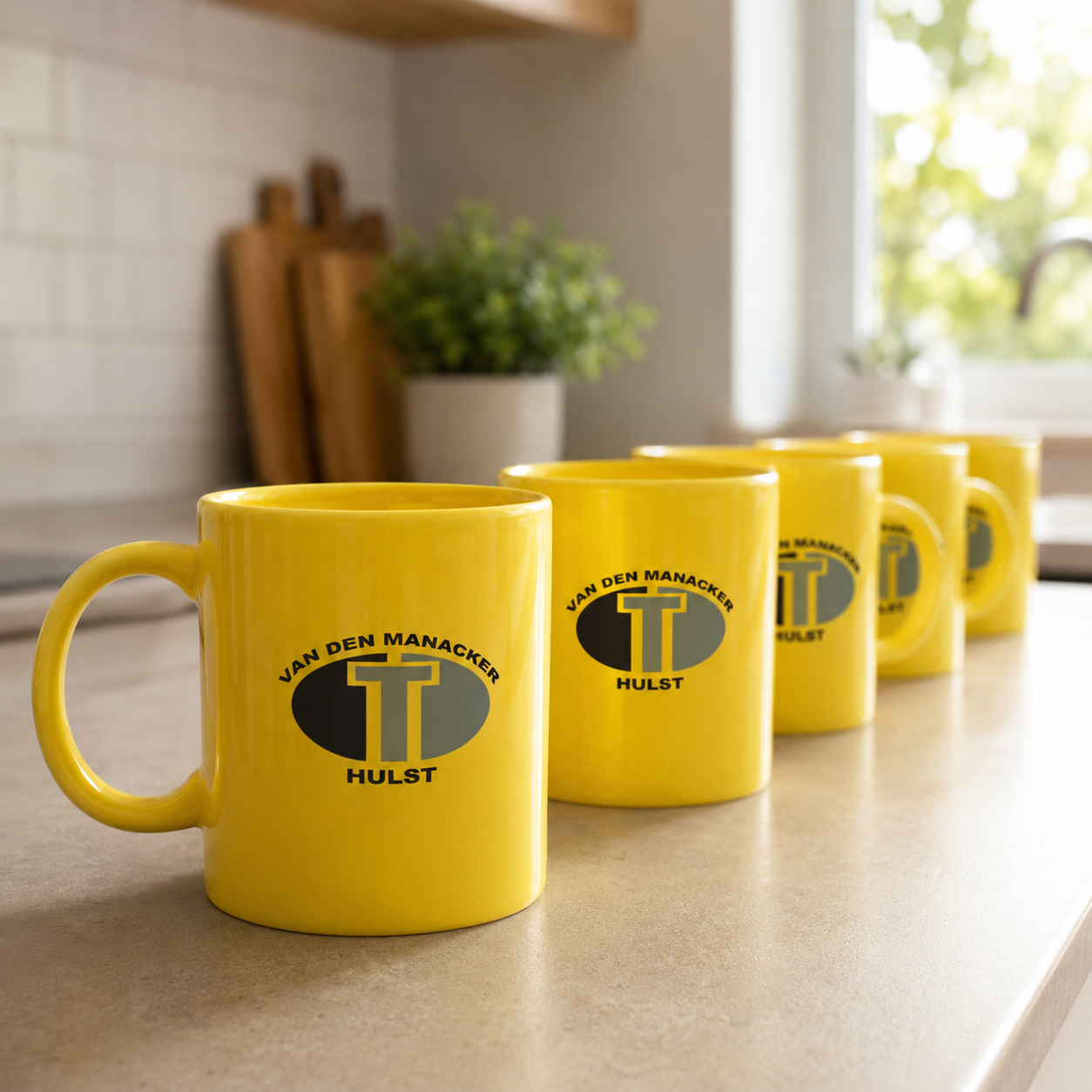 Bedrukte koffiekopjes voor Van den Manacker