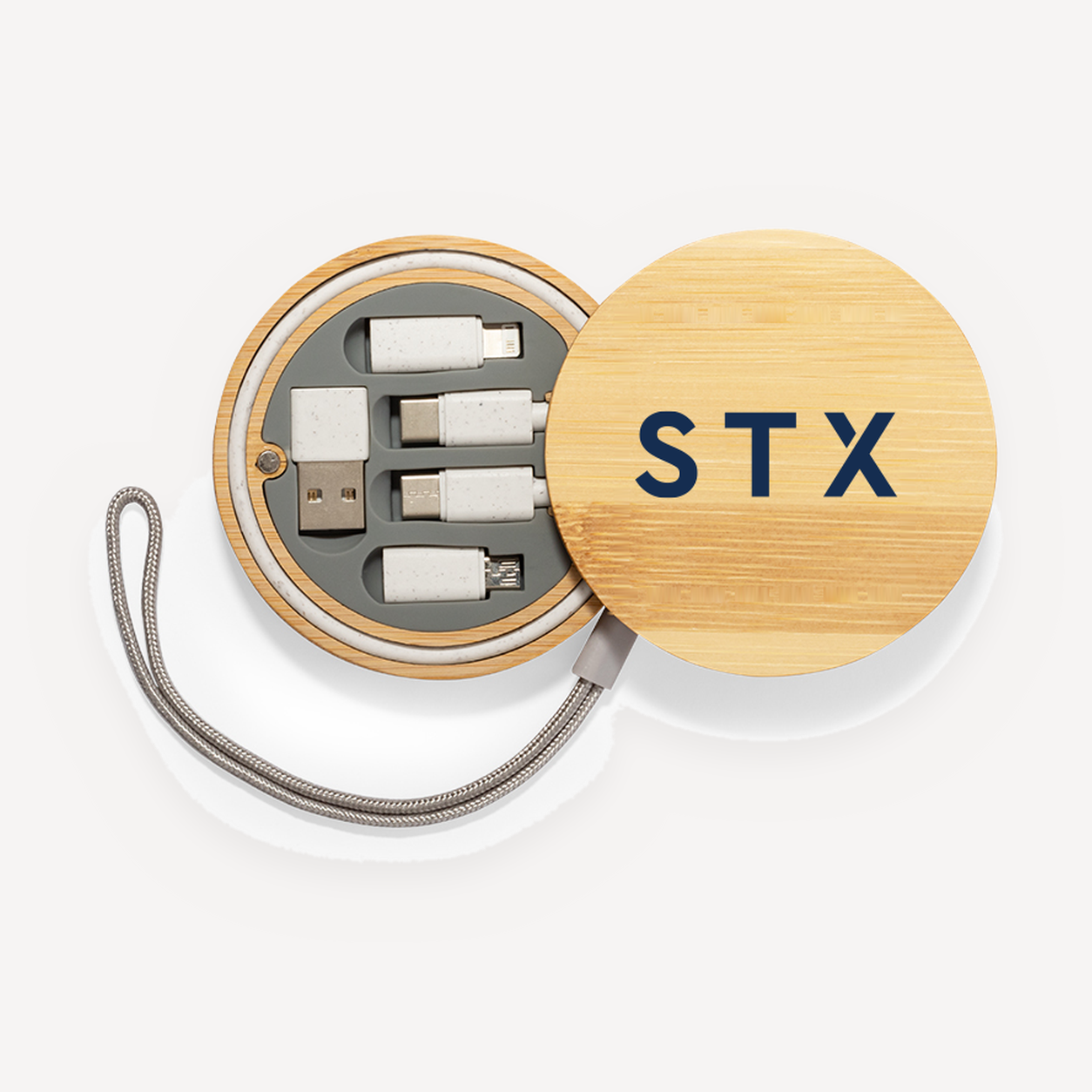 STX branded bamboo cable set with logo on the lid