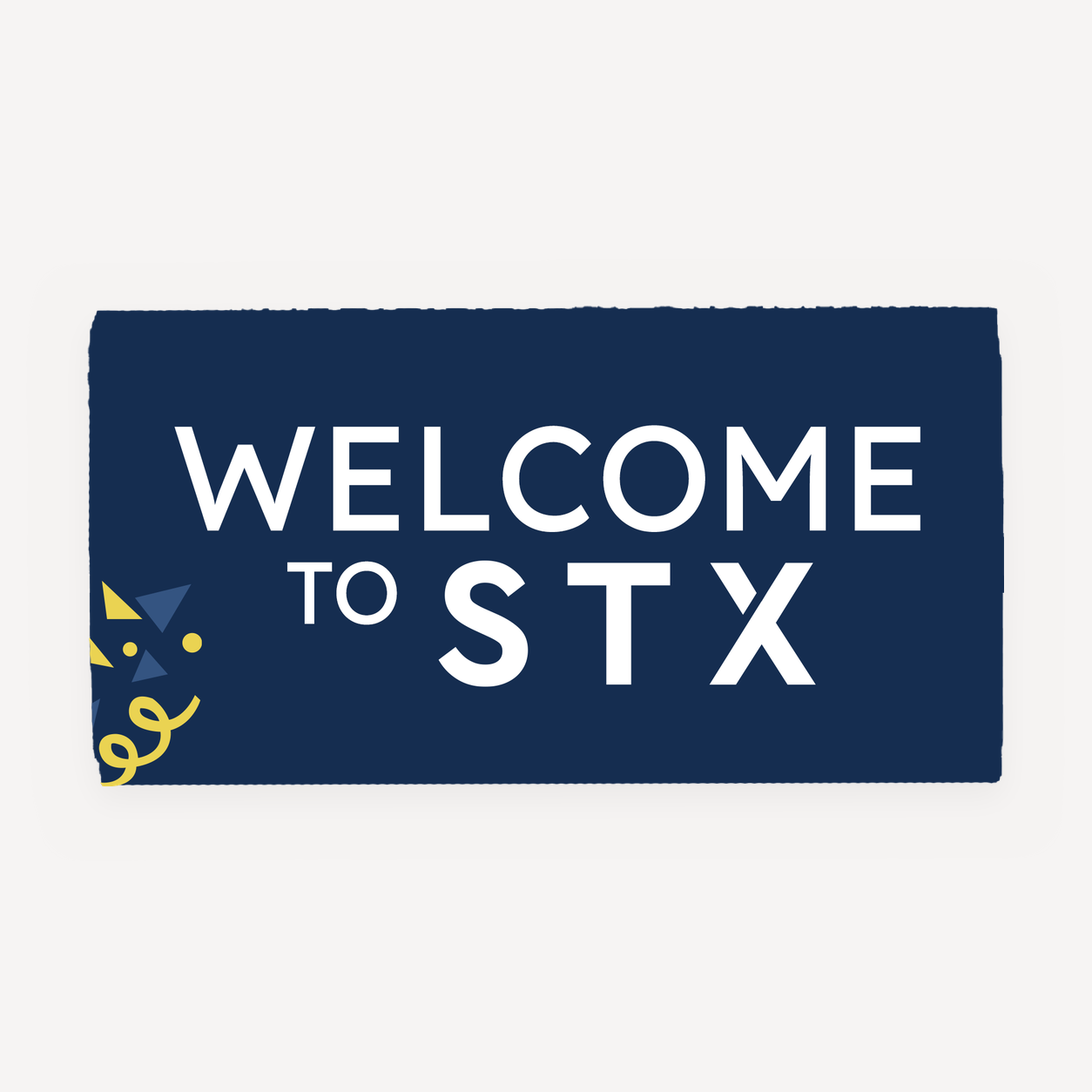 STX branded chocolate bar with Welcome to STX wrapper